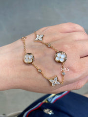 STAR AND SUN 4 MOTIF WHITE MOP PINK GOLD BRACELET