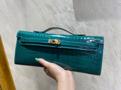 KELLY CUT 31 IN PINE GREEN SHINNY ALLIGATOR LEATHER WITH GOLD HARDWARE