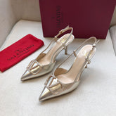 VLOGO SIGNATURE SILVER PATENT LEATHER SLINGBACK PUMP