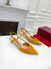 VLOGO SIGNATURE MUSTARD YELLOW PATENT LEATHER SLINGBACK PUMP