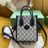 MINI TOTE 20 BAG IN BEIGE CANVAS AND BLACK CALFSKIN