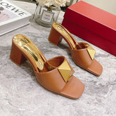 ONE STUD HEELED MULE 60 MM IN BRONZE BROWN CALFSKIN