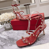 HIGH HEEL 6 CM SANDAL IN RUBY RED LAMBSKIN WITH STUDS