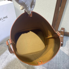 BUCKET 33 IN WHITE TRIOMPHE CANVAS AND BRONZE BROWN CALFSKIN TRIM