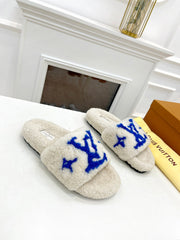 LV FLAT SLIPPER IN WHITE MIX COBALT BLUE SHEARLING