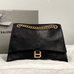 CRUSH MEDIUM CHAIN BAG 31 IN BLACK CRUSHED CALFSKIN GOLD HARDWARE