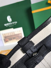 PETIT FLOT BUCKET BAG 22 IN BLACK GOYARDINE CANVAS AND LAMBSKIN TRIM