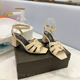 SL TRIBUTE SANDAL GLOSSY PASTEL YELLOW CALFSKIN