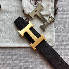 HM BELT BUCKLE & REVERSIBLE BLACK AND ORANGE LEATHER STRAP 38MM GOLD HARDWARE