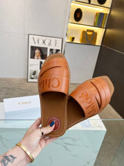 WOODY MULE IN BRONZE BROWM LAMBSKIN WITH EMBROIDERED LOGO
