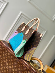 LV x YK ONTHEGO 35 IN BROWN MONOGRAM COATED CANVAS AND CALFSKIN PUMPKIN PATTERN