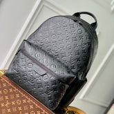 DISCOVERY PM BACKPACK 38 IN BLACK MONOGRAM LAMBSKIN