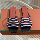 LP SPRIGHTLY CHARMS FLAT SANDAL WHITE AND BLACK CALFSKIN