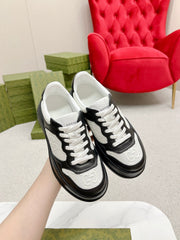 GG EMBOSSED TRAINER BLACK AND WHITE CALFSKIN