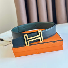 HM BELT BUCKLE & REVERSIBLE TEAL GREEN AND BLACK LEATHER STRAP 38MM GOLD HARDWARE