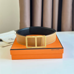 HM BELT BUCKLE & REVERSIBLE ORANGE PASTEL AND BLACK LEATHER STRAP 38MM GOLD HARDWARE