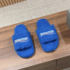 FURRY SLIDES IN COBALT BLUE CURLY SHEARLING