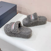 THICK-SOLED SLIPPERS IN GRAY WOOL