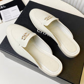 FLAT MULE IN WHITE LAMBSKIN 983819