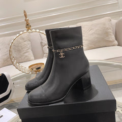 MID-HEEL ANKLE BOOTS IN BLACK SMOOTH CALFSKIN