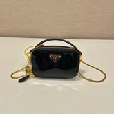 MINI HAND BAG 11 WITH GOLD STRAP IN BLACK PATENT CALFSKIN
