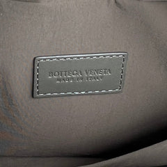 INTRECCIATO CLUTCH 26 IN CORDUROY GRAY CALFSKIN