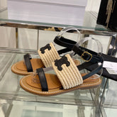 LYMPIAR FLAT STRAP SANDAL IN RAFFIA CALFSKIN BLACK BEIGE