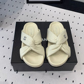 TWISTED SLIPPERS IN WHITE LAMBSKIN