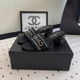 CC RHINESTONE LETTER HIGH HEELS BLACK AND WHITE LAMBSKIN