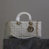 LADY D-JOY BAG 26 IN WHITE GRAPHIC CANNAGE CALFSKIN PALE GOLD-FINISH METAL CHARMS