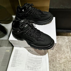 C'EST SNEAKER IN BLACK CALFSKIN AND BREATHABLE MESH