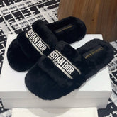 THICK-SOLE SLIPPERS BLACK SHEARLING WITH EMBROIDERED LOGO