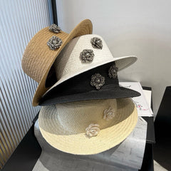 FLAT STRAW HAT BLACK FLOWER ATTACHMENT 673929