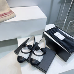 CHANEL FLAT MARY JANE SHOES 25S IN WHITE MIX BLACK LAMBSKIN EMBOSSED LOGO WITH BOW