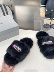 BALENCIAGA 25S FUR SLIPPERS IN BLACK FAUX SHEARLING