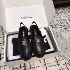 SLINGBACK LOAFER IN BLACK CALFSKIN AND SHEARLING