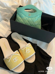 CC STRIPED SLIDE SANDALS IN YELLOW AND WHITE CANVAS