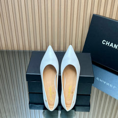 CHANEL 25S POINTED-TOE MARY JANE SHOES IN WHITE CALFSKIN