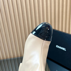 CHANEL 25S BOOTS WITH PATENT TOE CAP 50MM IN BEIGE AND BLACK CALFSKIN