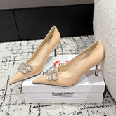 POINTED HIGH PUMPS IN LUXE BEIGE PATENT CALFSKIN WITH CRYSTAL BUCKLE