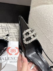 POINTED HIGH SLINGBACK IN BLACK PATENT CALFSKIN WITH CRYSTAL BUCKLE