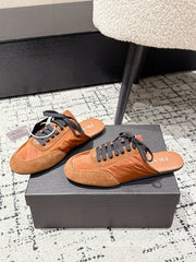 PRADA 25S DEXUN MULE IN BURNT ORANGE SUEDE LEATHER