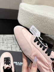 PRADA 25S COLLAPSE SNEAKERS IN LIGHT PINK RE NYLON AND SUEDE