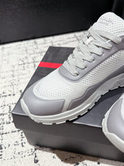 PRADA 25S MEN SNEAKERS IN GRAY AND WHITE CANVAS
