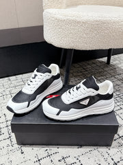 PRADA 25S MEN SNEAKERS IN BLACK AND WHITE CANVAS