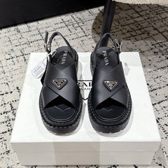 PRADA 25S CRISSCROSS SANDALS IN BLACK CALFSKIN LOGO