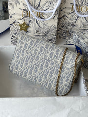 DIOR 25S MEDIUM SADDLE POUCH WITH CHAIN 21 IN LIGHT BLUE DIOR OBLIQUE JACQUARD CANVAS
