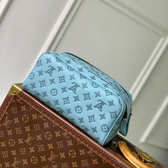 DOPP KIT 28 IN SKY BLUE MONOGRAM SHADOW CALFSKIN EMBOSSED LOGO