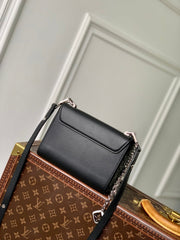 TWIST SLIM 19 IN BLACK TAURILLON CALFSKIN WITH PEARL CHAIN