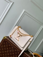 TWIST SLIM 19 IN LIGHT PINK TAURILLON CALFSKIN GOLD HARDWARE